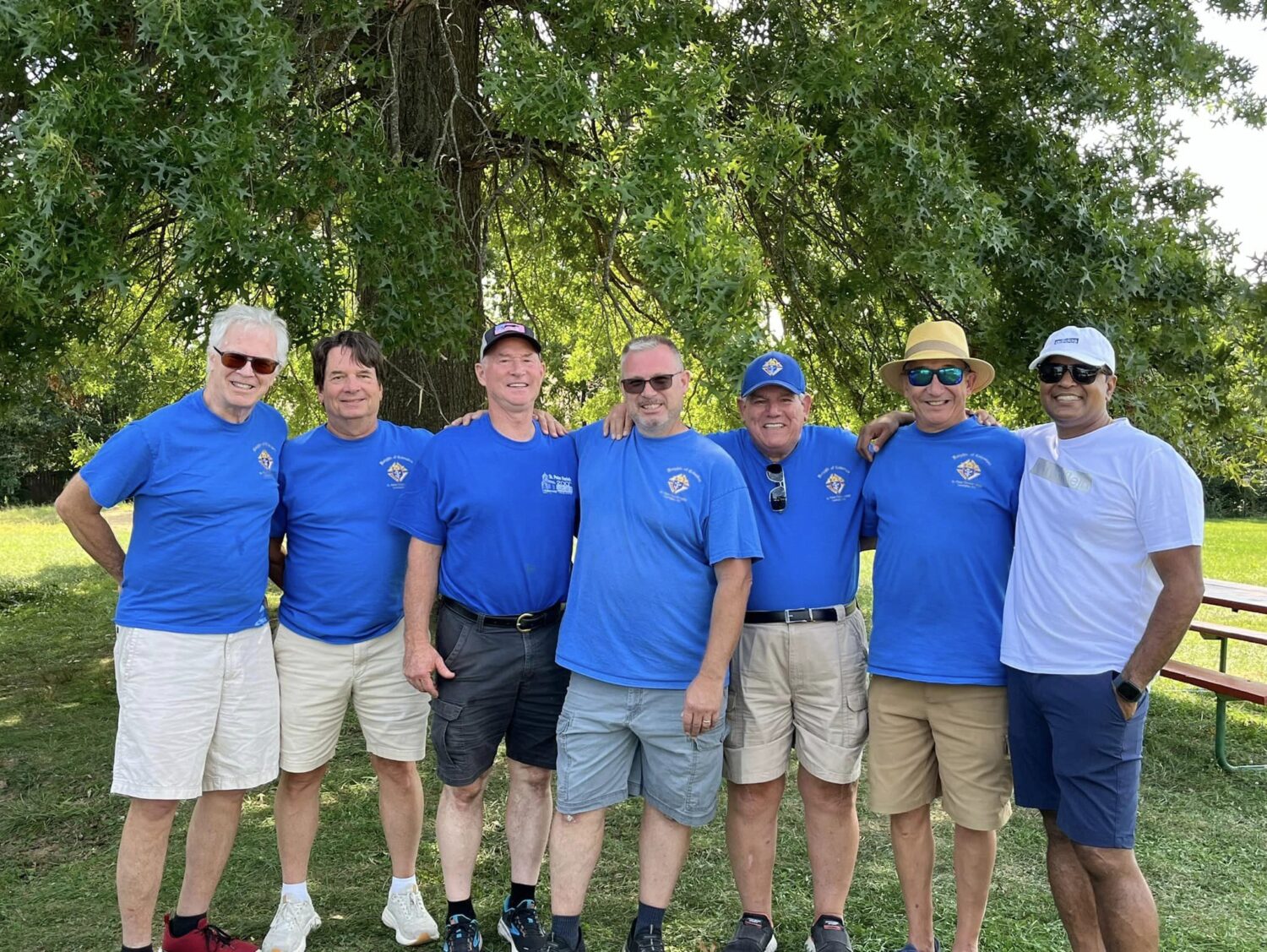 Men of St. Peter's Church serving Christ in his Vineyard